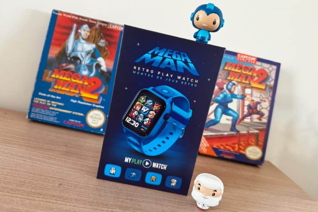 Packaging de la montre Mega Man Retro Play Watch entouré de jeux NES Mega Man 2